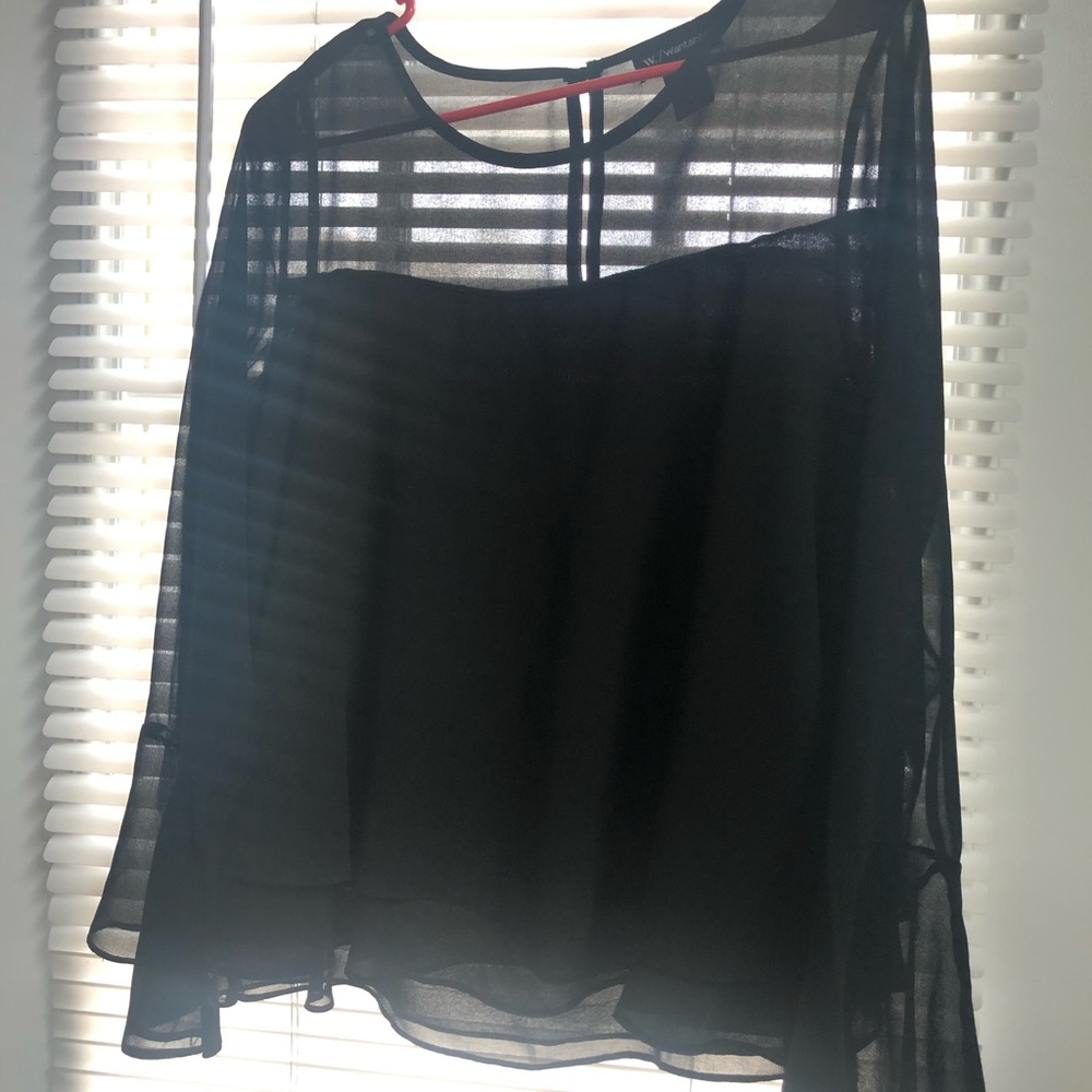 Black sheer & solid shirt.
